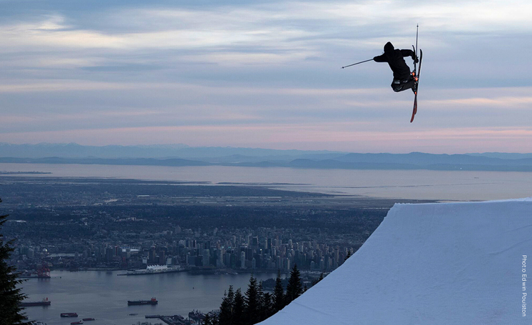 Skier jumping in Grouse Mountain Terrain Park.